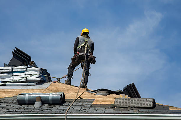 Professional Roof Replacement technician working in Lincoln City, IN